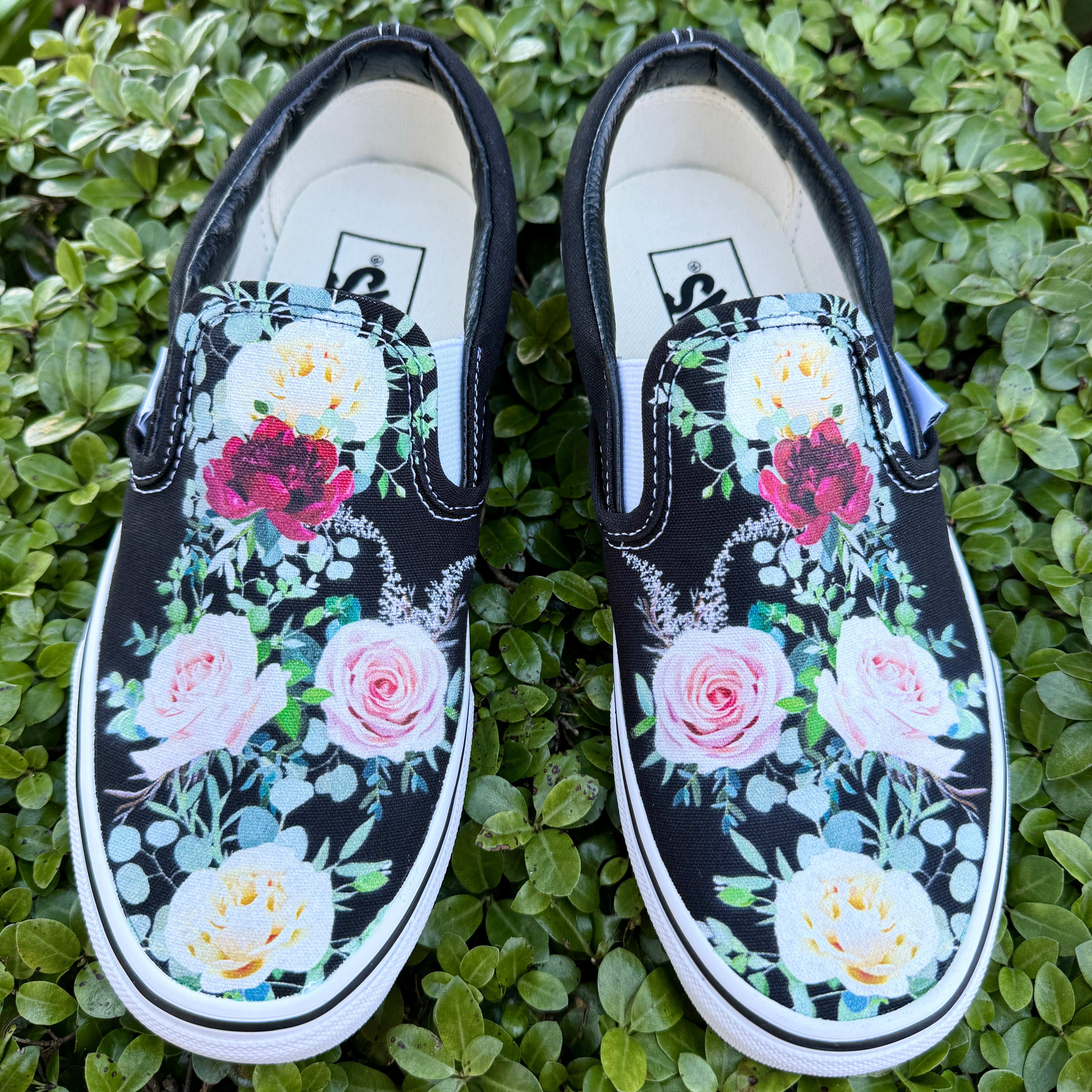 Black slip on vans with roses best sale