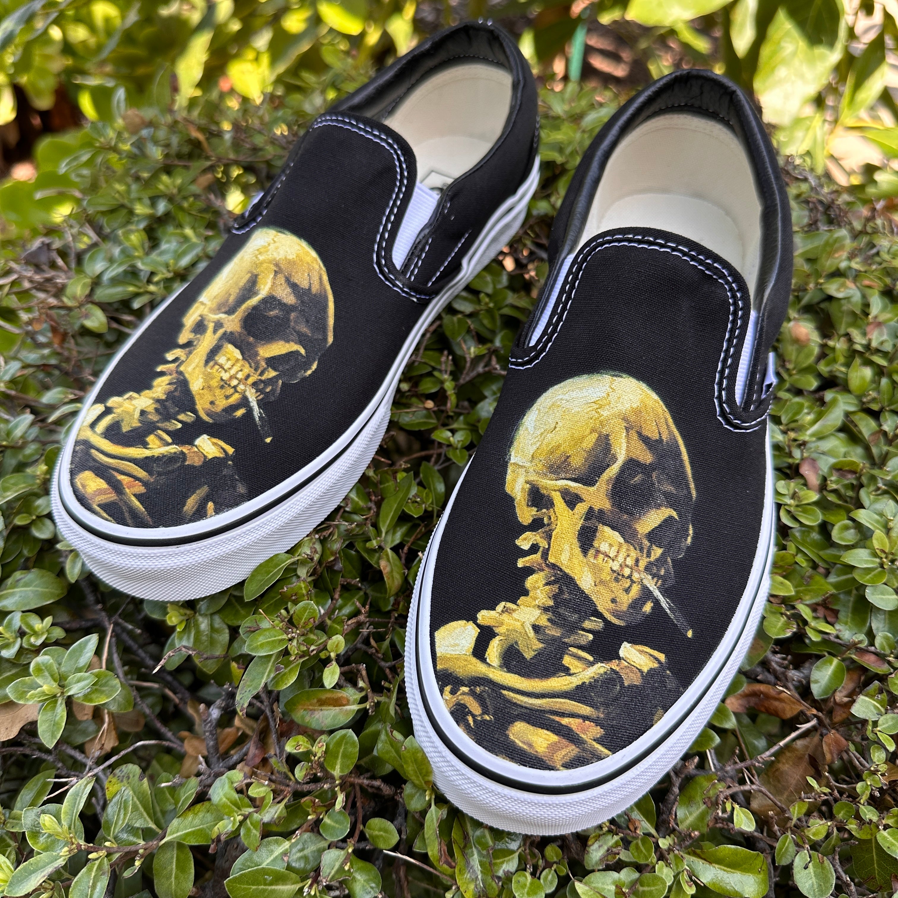 Skeleton slip on on sale vans