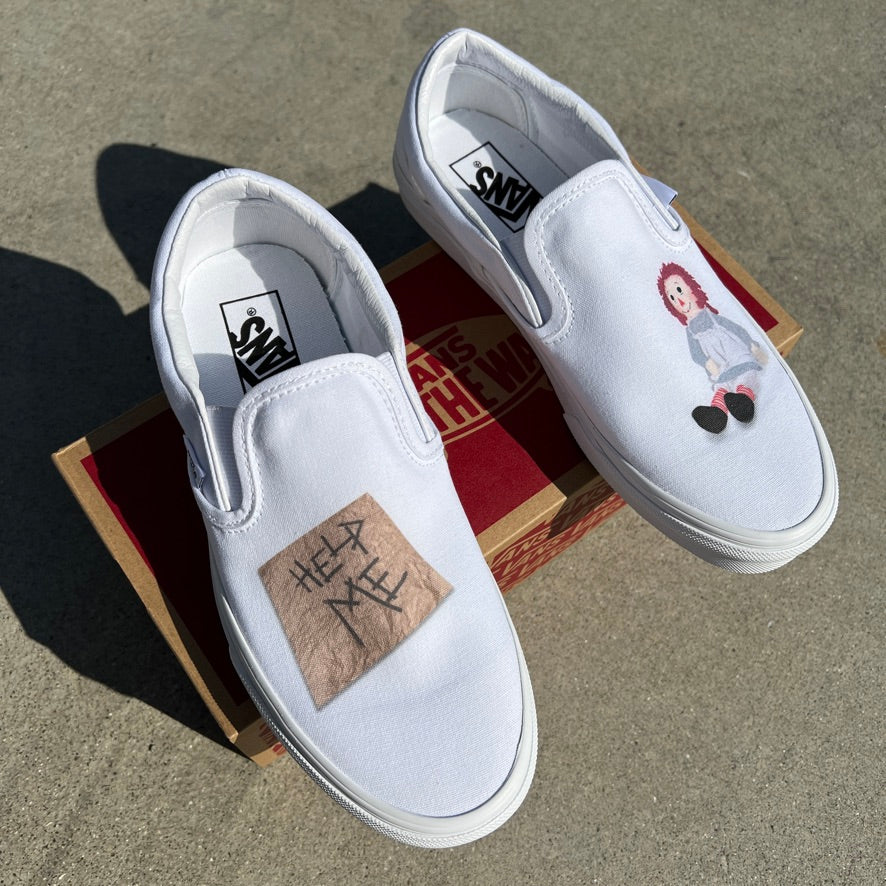 Vans white clearance slip on sale