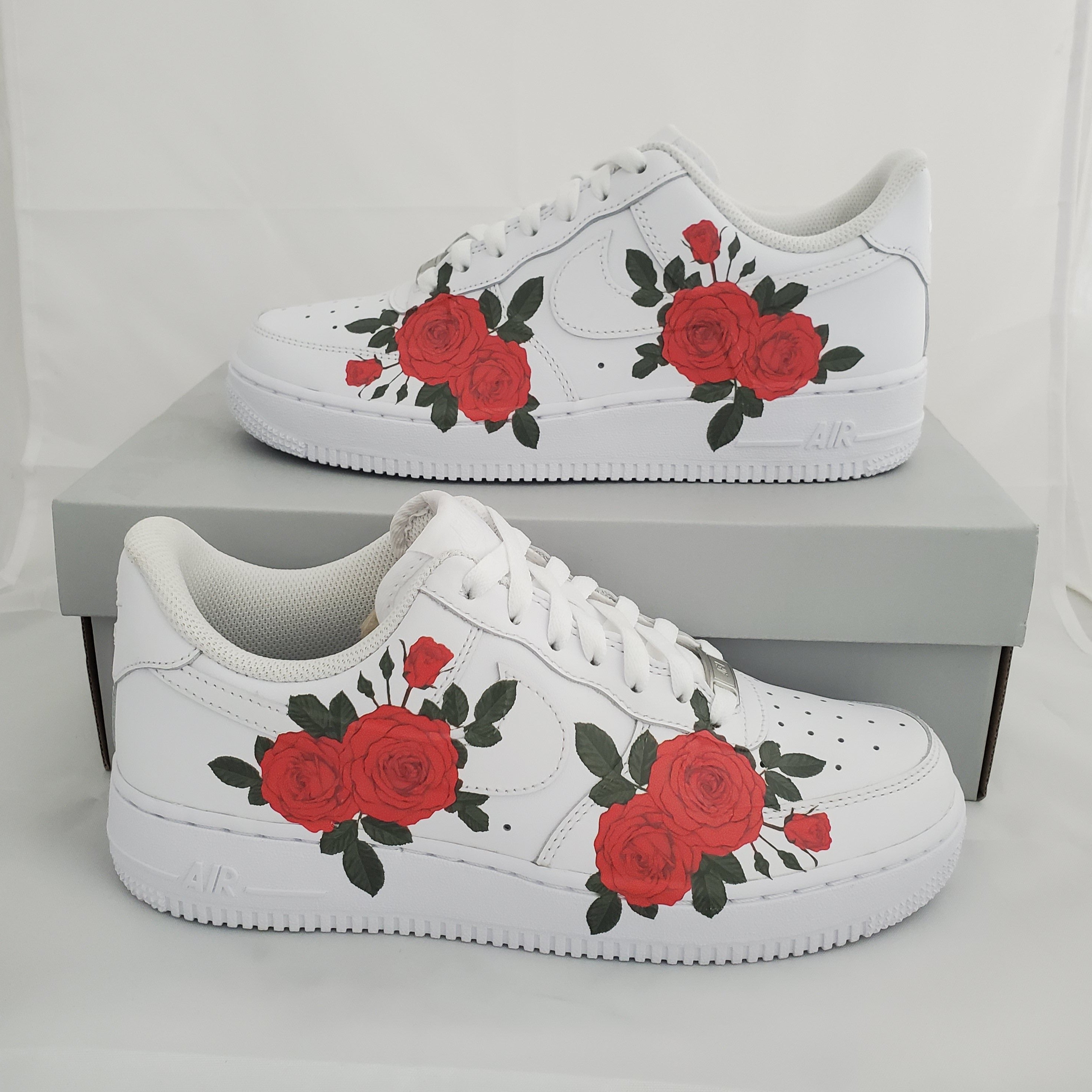 White shoes with store red roses