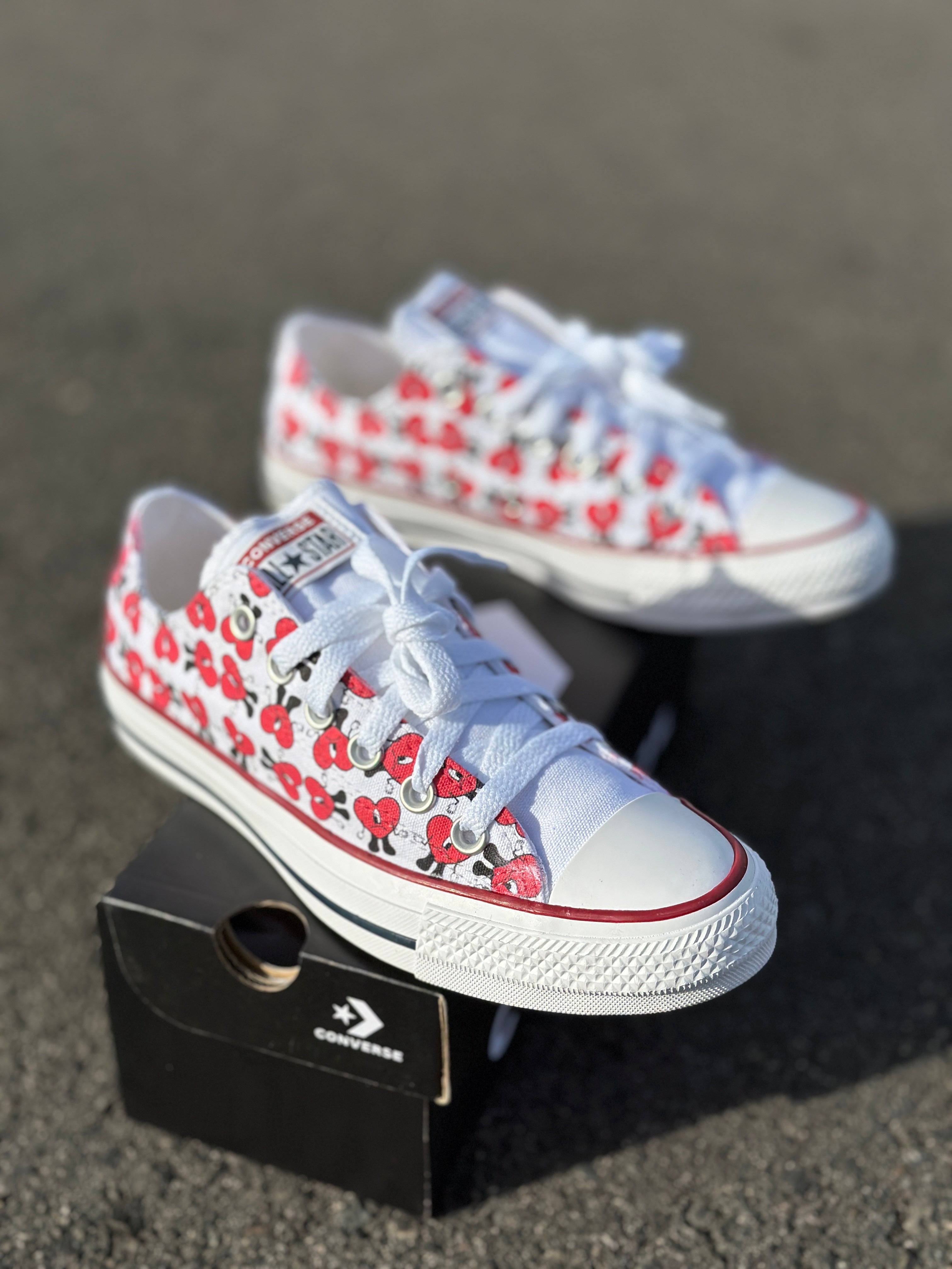 White chucks clearance with red heart